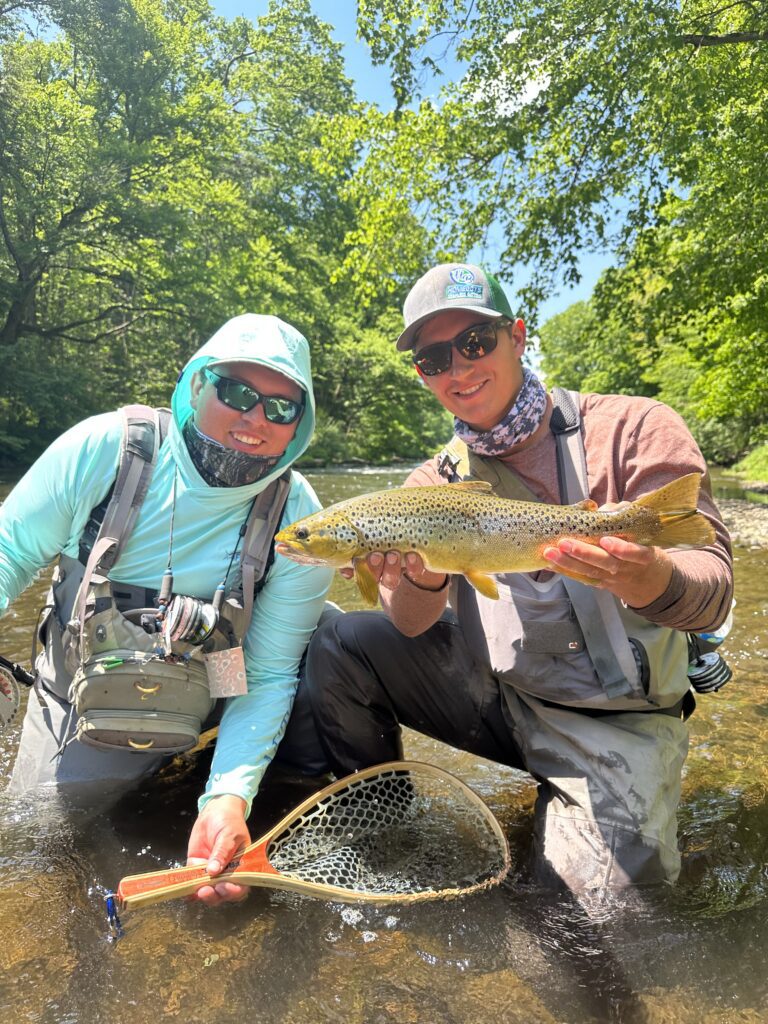 guided client holding trophy wild brown trout caught with keystone anglers guide service on a trip to the little juniata river near spruce creek pennsylvania